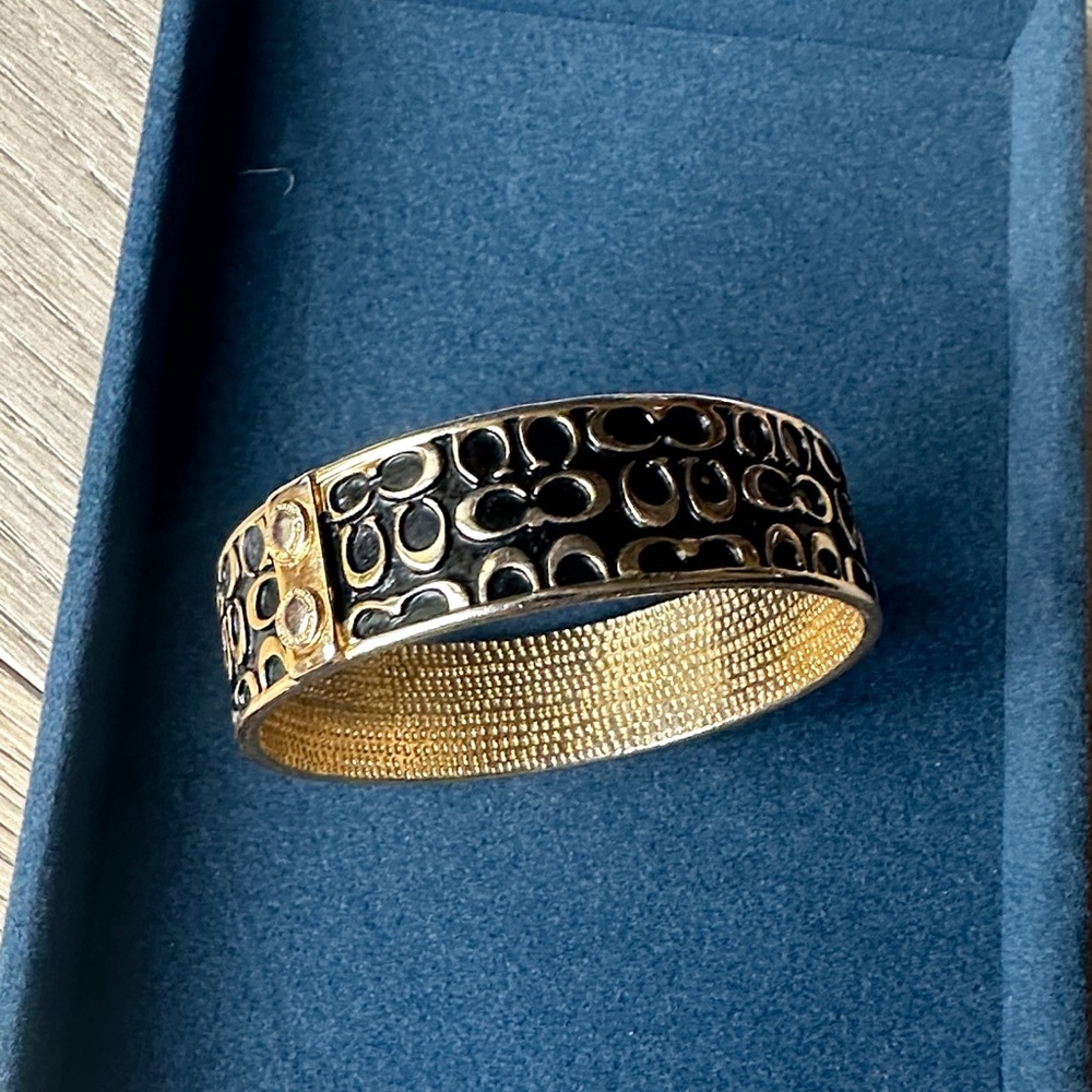 Coach Black and Gold Signature Cuff Bracelet